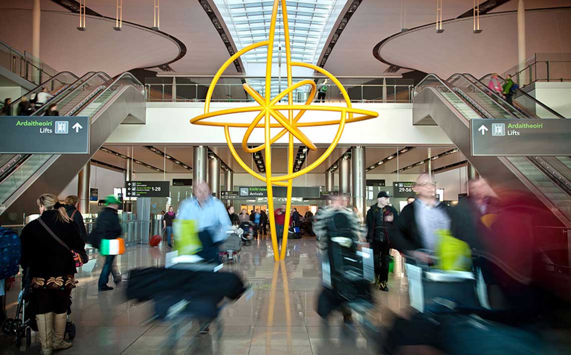 Yellow sculpture in Dublin Airport Terminal 2 arrivals concourse.